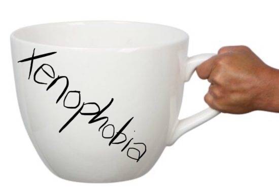Giant Coffee Mug with Xenophobia written on the side